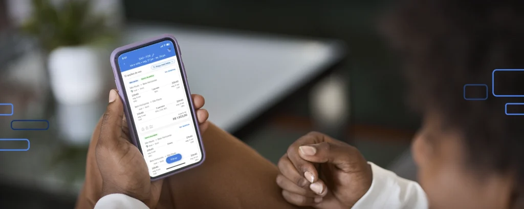 colaborador fazendo reserva para viagem corporativa com vexpenses viagens
